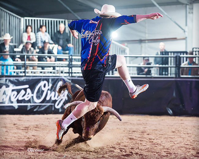 Zach Call of Mullen, Neb., jumps his bull during the Wildcard Round of the Bullfighters Only Las Vegas Championship on Friday at the Hard Rock Hotel & Casino. Call won the round and advanced to Saturday's short round. (TODD BREWER PHOTO)