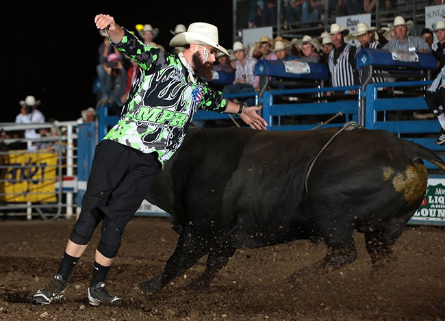 Weston Rutkowski performs a cape maneuver during Friday's bout against WAR Fighting Bulls' War Machine. Rutkowski scored 86.5 points to win the Bullfighters Only event in Cody, Wyo. (BULL STOCK MEDIA PHOTO)