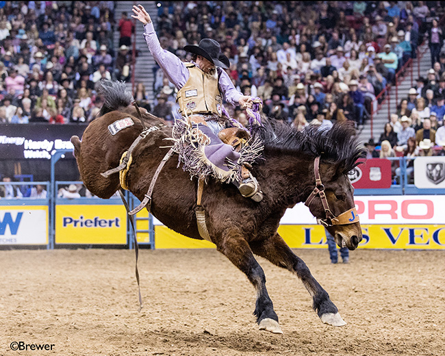 Hardy Braden rides J Bar J's Special Time for 85.5 points to finish in a tie for third place in Sunday's fourth go-round of the Wrangler National Finals Rodeo. (TODD BREWER PHOTO)