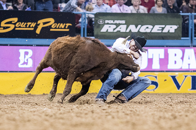 Tyler Pearson closes out a 3.6-second run during Wednesday's seventh round of the National Finals Rodeo. He earned another $18,192 and pushed his NFR income to nearly $101,000. (TODD BREWER PHOTO)