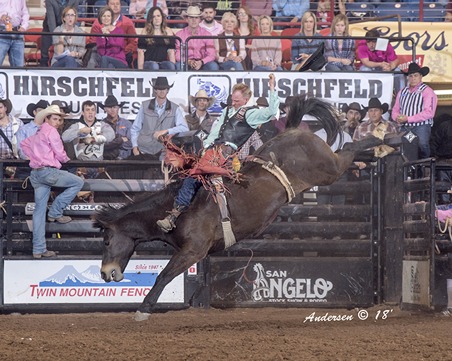 Logan Corbett rides Pete Carr's Classic Pro Rodeo's Black Widow for 87 points to win the first round of bareback riding at the San Angelo Stock Show and Rodeo. (RIC ANDERSEN PHOTO)